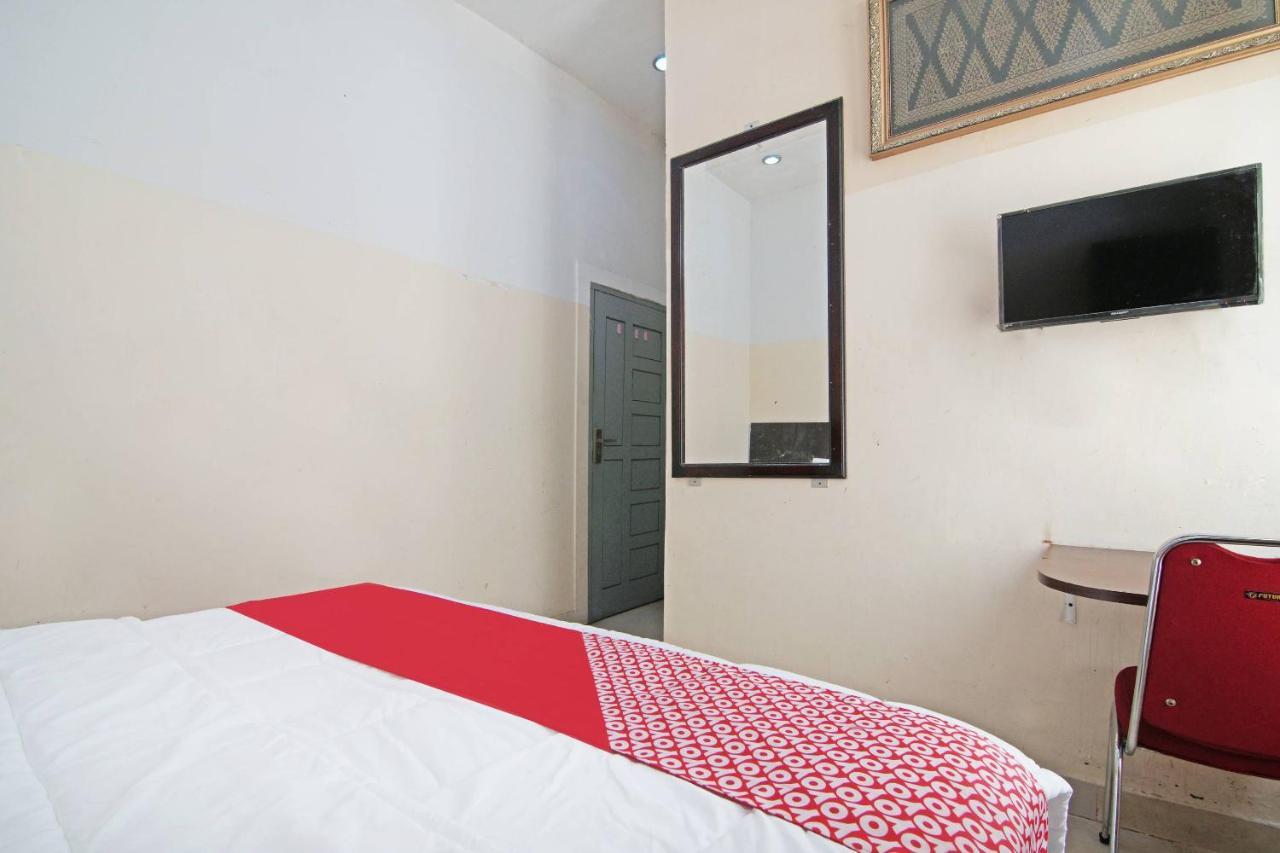 Oyo 91510 Homestay Utama Syariah Pekanbaru Buitenkant foto