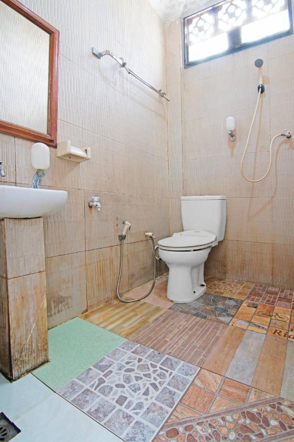 Oyo 91510 Homestay Utama Syariah Pekanbaru Buitenkant foto