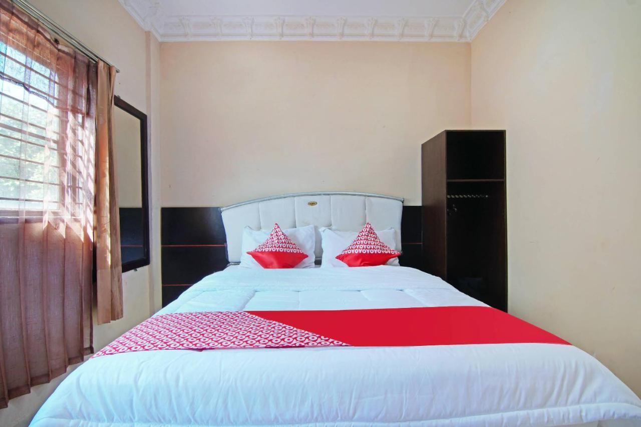 Oyo 91510 Homestay Utama Syariah Pekanbaru Buitenkant foto